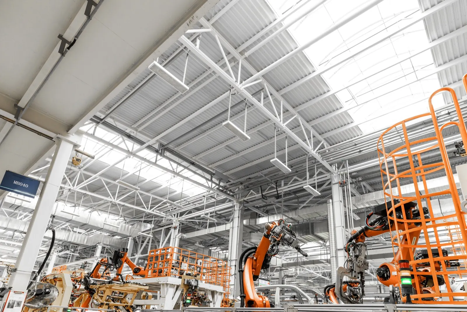 Automotive assembly line with robotic welding in a production plant